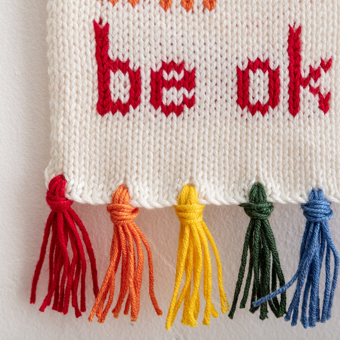 Everything will be ok knitted wall hanging