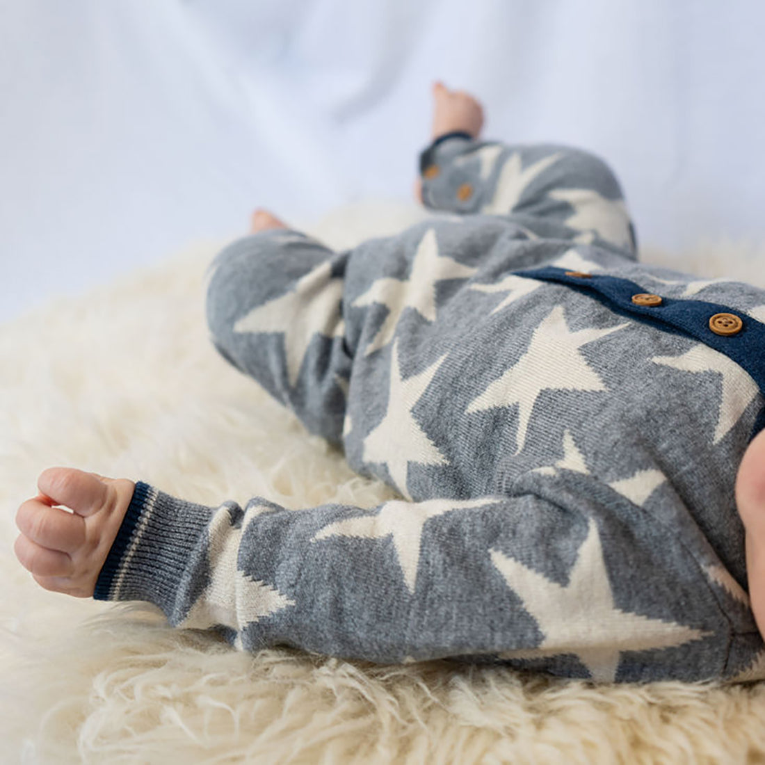 Stars knitted romper in grey