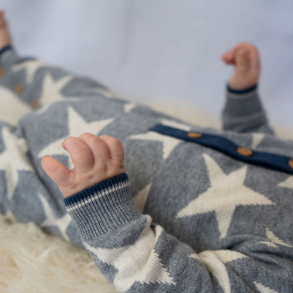 Stars knitted romper in grey