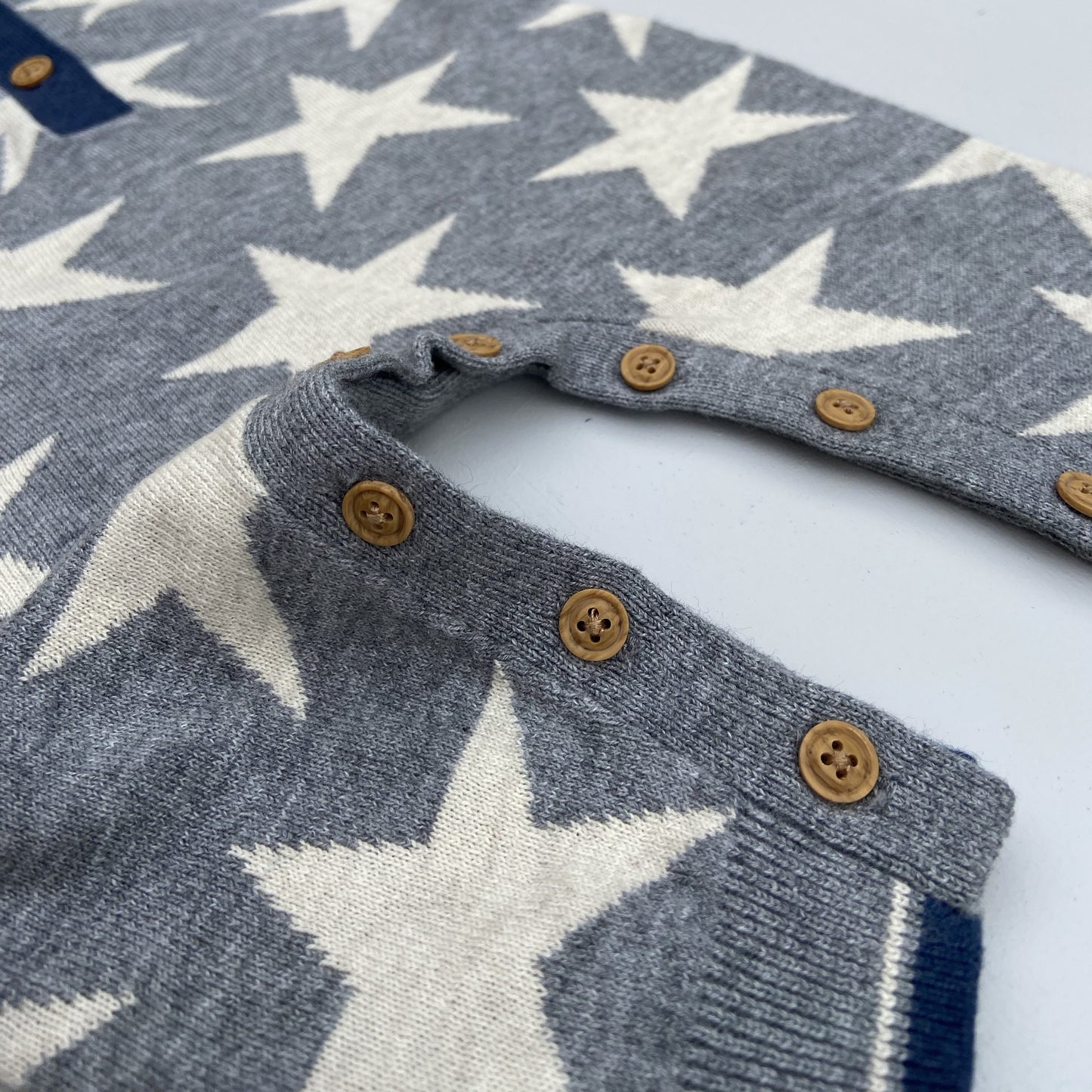 Stars knitted romper in grey
