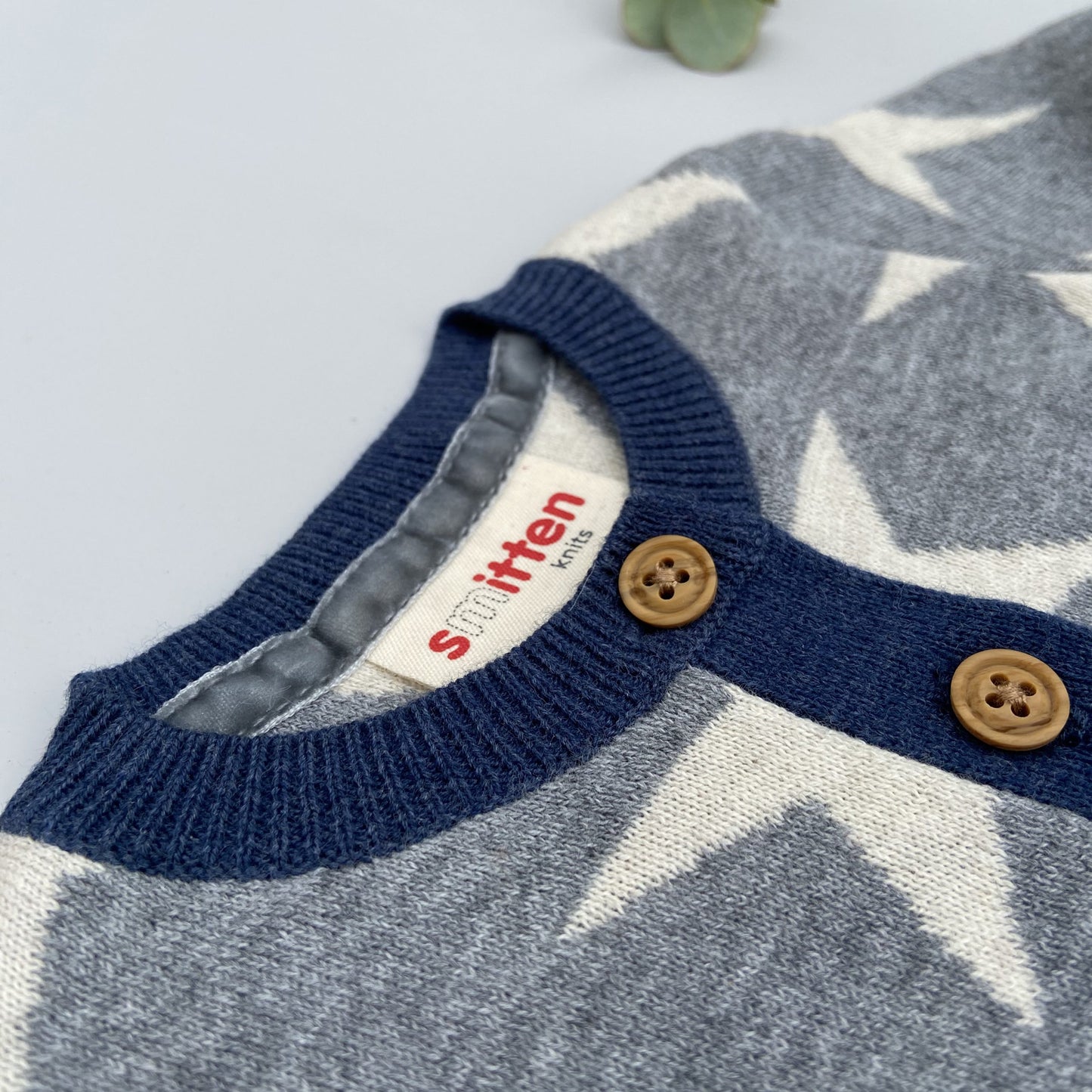 Stars knitted romper in grey