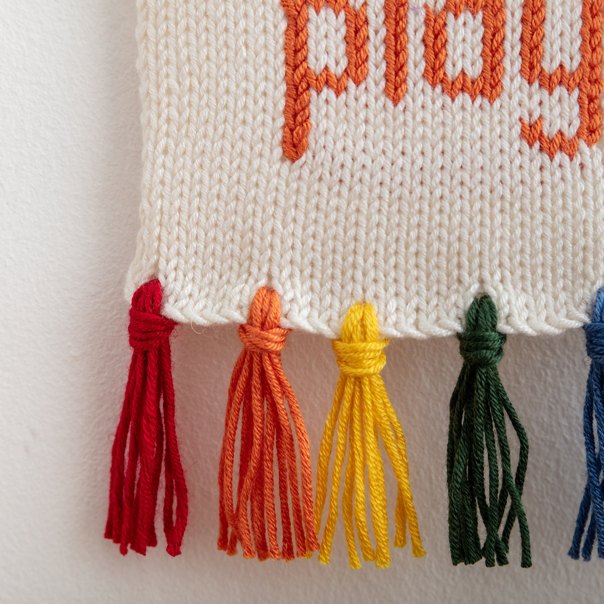 let's play knitted wall hanging